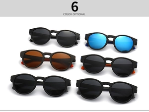 Flat lay of six polarized square sunglasses in various colors on a white background