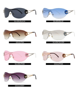 Matrix display of Y2K shield sunglasses in seven color variants with star detail