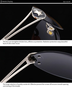 Detail of silver metal hinge and star-shaped decoration on modern wrap-around sunglasses
