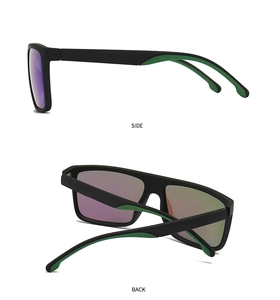 Detail view of square matte black polarized sports sunglasses with green interior accents