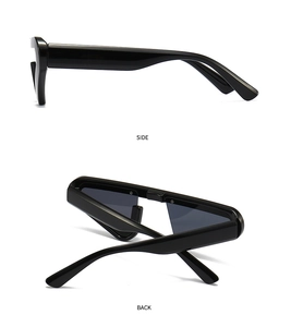 Side and back view of chunky black cat eye sunglasses with thick frames and dark lenses