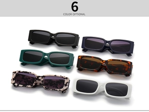 Flat lay of rectangular vintage sunglasses in six colors including leopard and marble print