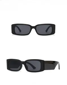 Front and side view detail of vintage black rectangle sunglasses with thick frame