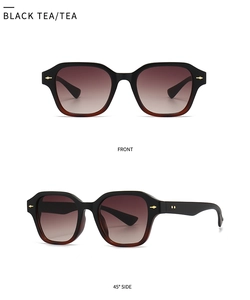Détail de lunettes de soleil rétro avec décor flèche dorée et dégradé thé noir chic