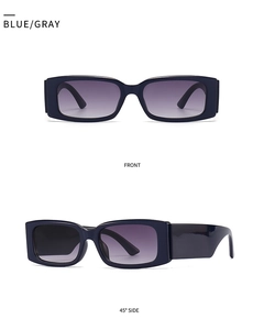 Close-up of modern rectangular sunglasses with blue frames and gray gradient lenses