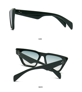Detail view showing side and back of dark green cat eye sunglasses with silver studs