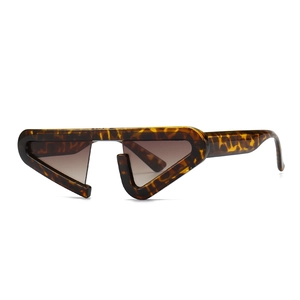 Fashionable leopard print small triangle sunglasses with brown gradient lenses for street style