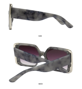 Detail of marble pattern frames and purple gradient lenses from side and back views