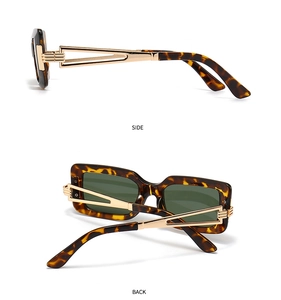Detail view of tortoiseshell sunglasses with gold hollow metal temples and green lenses