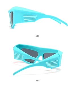 Side and back view of blue oversized futuristic sunglasses with embossed temples