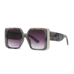 Modern cat-eye square sunglasses with marble frame and purple gradient lenses in 45-degree view