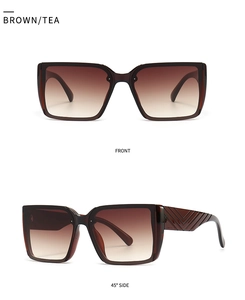 Detail view of large square brown tea gradient sunglasses with textured V-shaped temples