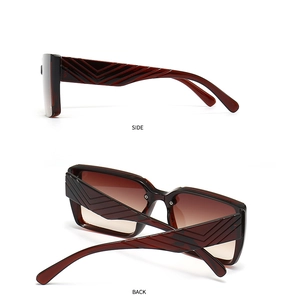 Detail view showing the V-shaped textured temple design and side profile of sunglasses