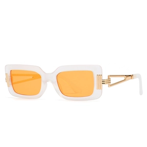 Modern rectangle sunglasses with translucent white frames and gold metal temple accents