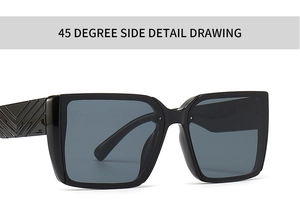 Close-up of black square sunglasses with V-shaped geometric textures on the side temple