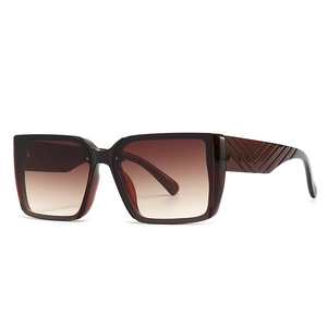 Fashionable oversized square sunglasses with tortoiseshell frame and gradient brown lenses
