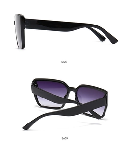 Side and back view of oversized black polygon sunglasses with purple gradient lenses