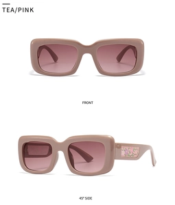 Detail view of tea pink rectangular sunglasses with floral side patterns and gradient lenses