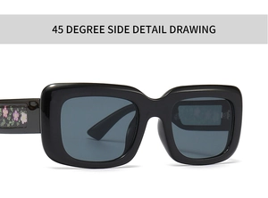 Detail view of square black sunglasses with colorful floral patterns on the temples