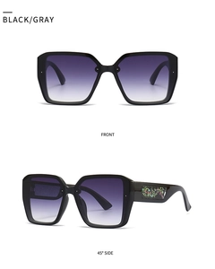 Detailed front and side views of black square sunglasses with floral temple patterns