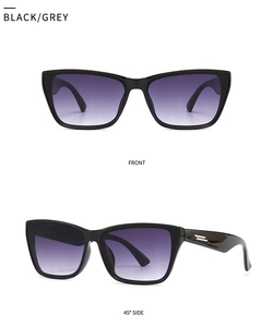Vues de face et de profil de lunettes de soleil œil de chat noires à verres dégradés