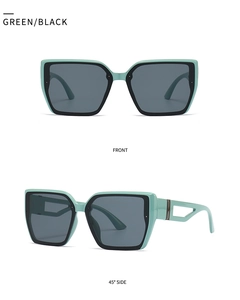 Détail des lunettes de soleil carrées vert et noir montrant les angles avant et de côté