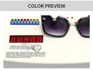 Testing UV400 protection on black square sunglasses with purple gradient lenses