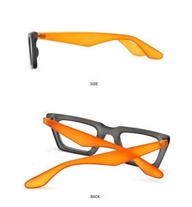 Detalle de las modernas gafas de sol estrechas de ojo de gato en gris y naranja, vista lateral