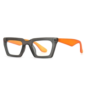 Gafas de sol cat-eye modernas con montura gris y patillas en naranja vibrante
