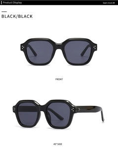 Vues de face et de côté à 45 degrés des lunettes de soleil noires avec rivets argentés