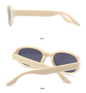 Side and back view of retro cream-colored sunglasses with oval dark grey lenses