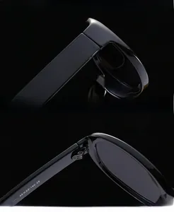 Macro detail of high-quality reinforced hinges and temple specifications on black sunglasses