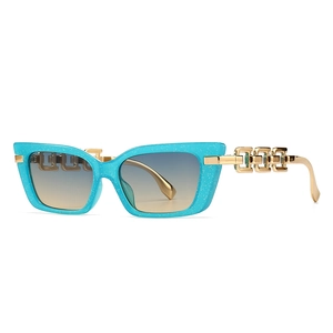 Modern rectangle cat-eye sunglasses with blue glitter frame and gold chain temples