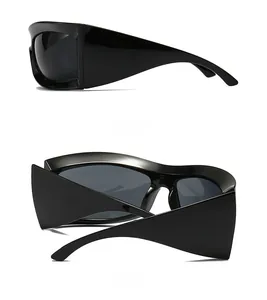 Side and back view of oversized black sporty sunglasses with wide temples and glossy finish