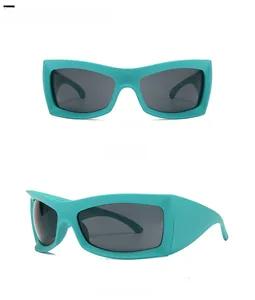 Front and 45-degree side view of matte green cycling sunglasses with grey lenses