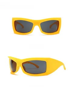 Front and side view of oversized yellow rectangular frame sunglasses with dark lenses