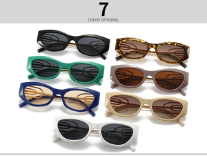 Detailed stack of seven colorful retro cat-eye sunglasses with unique hollowed temples