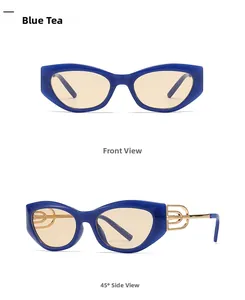 Cat eye sunglasses with blue frames and unique gold interlocking hollow temple design