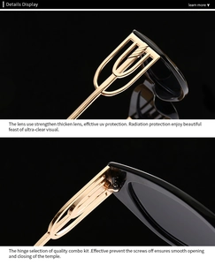 Detail of cat eye sunglasses with gold hollow metal temples and sturdy hinge components