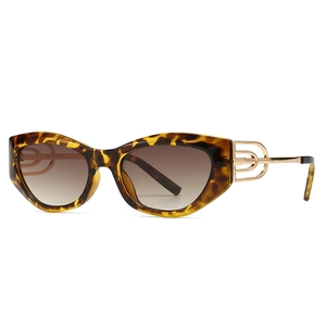 Retro leopard cat-eye sunglasses with gradient lenses and golden temple accents