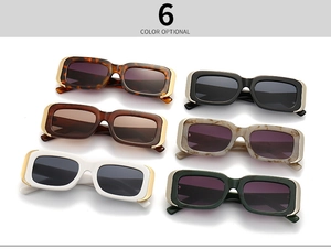 Flat lay of six colorful rectangular sunglasses with stylish gold metal temple accents