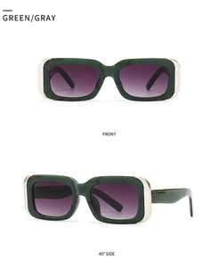 Macro detail of green marble texture sunglasses with gold metal corners and purple lenses