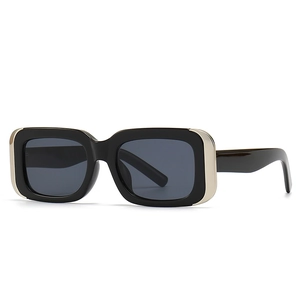 Modern rectangular cat-eye sunglasses in black with silver metal trim details