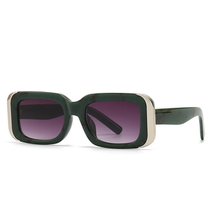 Modern cat-eye sunglasses with green marble frames and purple gradient lenses