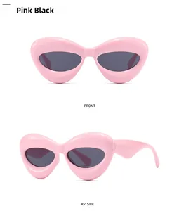 Detail view of pink polygonal futuristic sunglasses showing front and 45-degree side angles