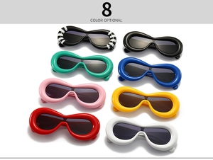 Detail view of 8 color options for wavy chunky frame sunglasses in futuristic style