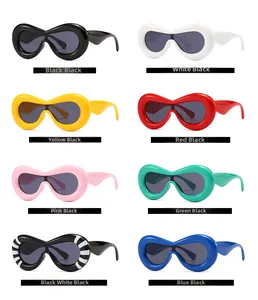 Collection of futuristic wraparound sunglasses in eight trendy colors with wide oval frames