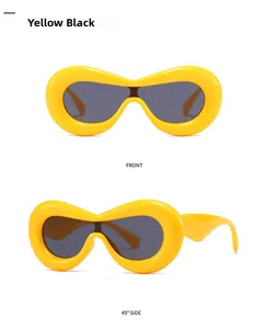 Close-up of futuristic thick yellow frames with dark grey lenses in two angles