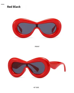 Front and 45-degree angle detail of red wrap-around futuristic polygon sunglasses