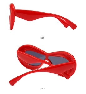 Side and back view of red chunky padded-style sunglasses with dark grey lenses